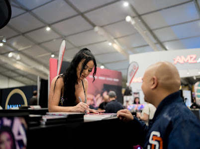 AVN Expo 2024 Photos: Best of Cam Models, Cosplay & Convention Floor